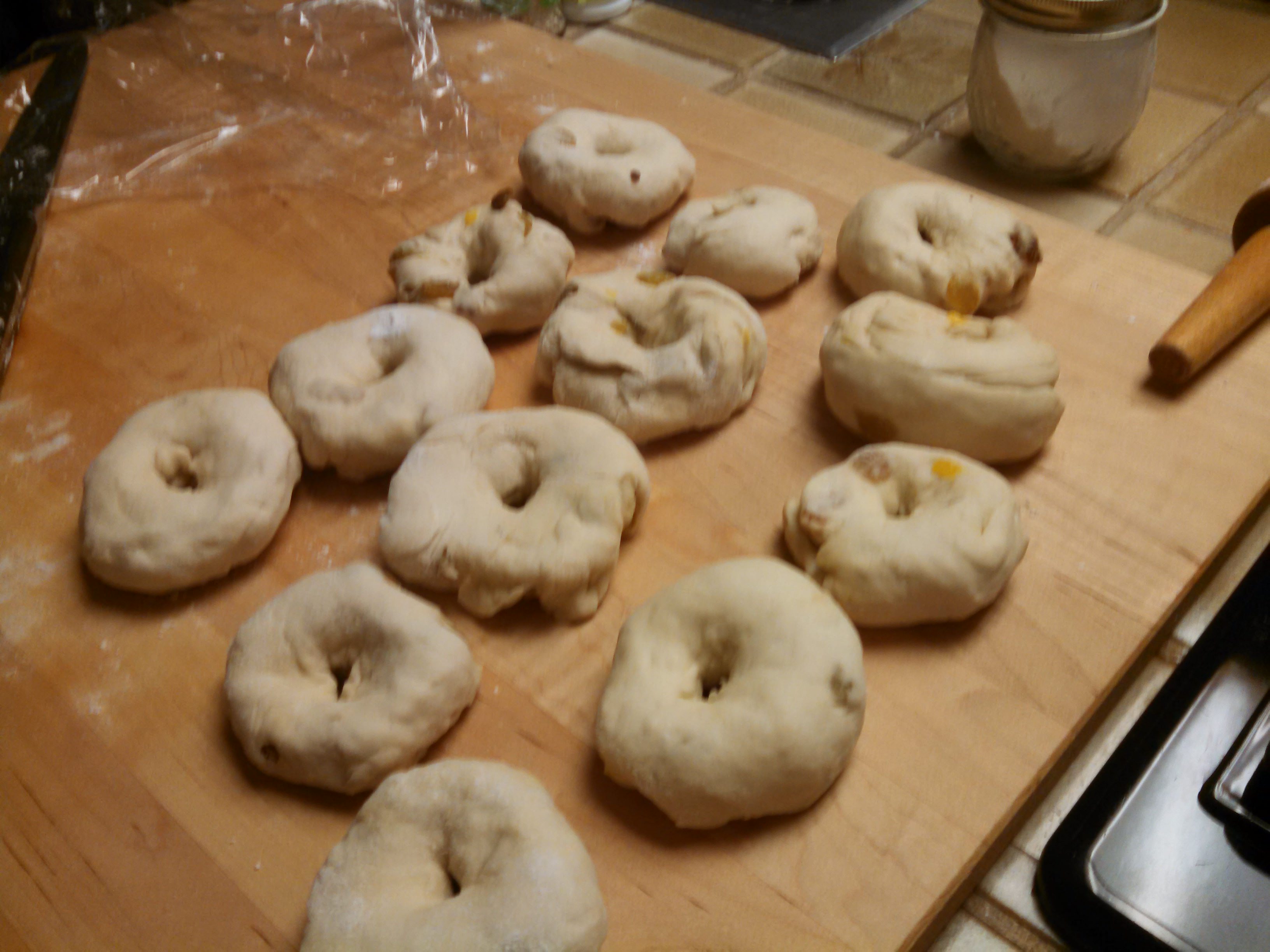A baker's dozen bagels, ready to boil.