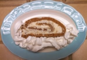 Serving of Pumpkin Roll with Whip Cream